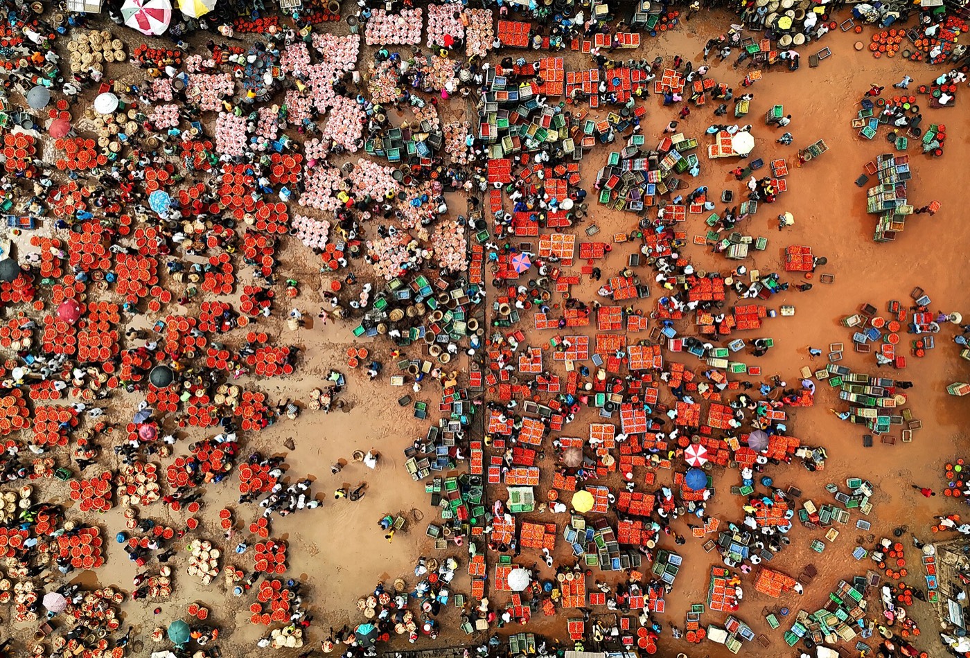 A crowded tomato market in Lagos seen from above