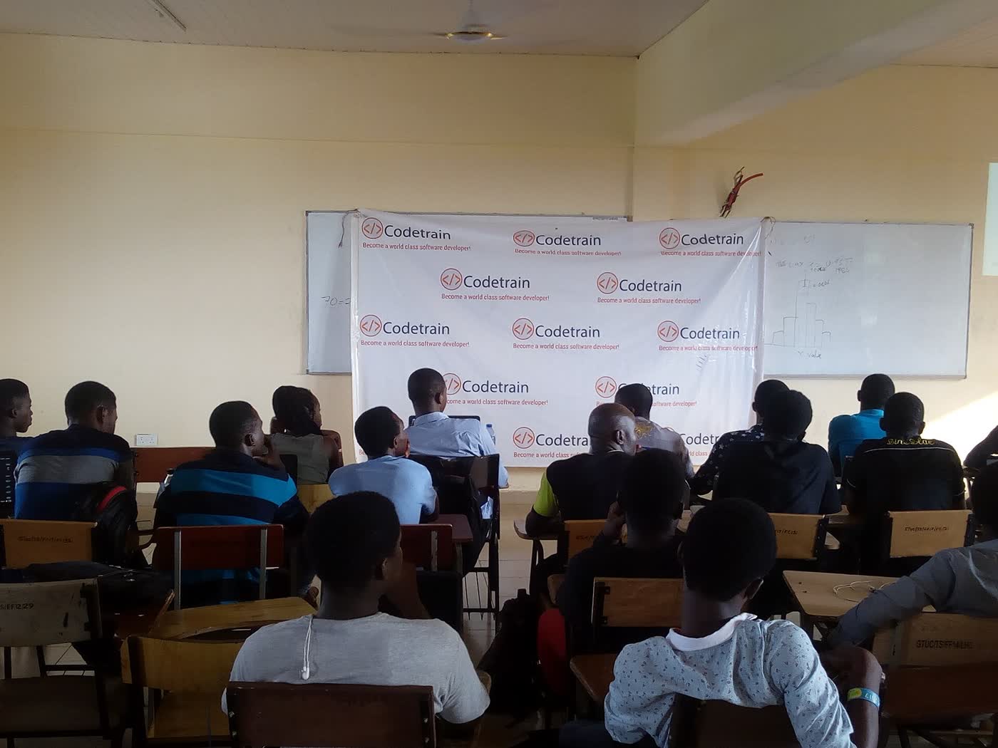 A classroom of learners at a coding bootcamp